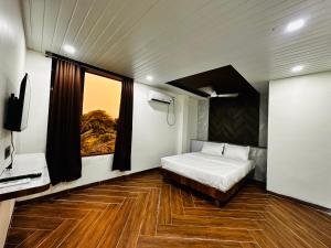 Postel nebo postele na pokoji v ubytování ParNam Hotel + 18 fotografií