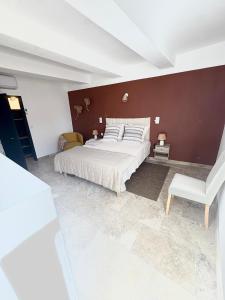 Ένα ή περισσότερα κρεβάτια σε δωμάτιο στο Charmante maisonnette de village avec sauna +3 φωτογραφίες