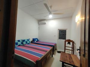 Letto o letti in una camera di Dark waves villa