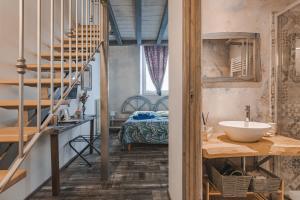 Posteľ alebo postele v izbe v ubytovaní Trieste Art Loft
