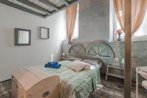 Posteľ alebo postele v izbe v ubytovaní Trieste Art Loft