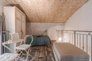 Posteľ alebo postele v izbe v ubytovaní Trieste Art Loft