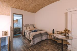 Posteľ alebo postele v izbe v ubytovaní Trieste Art Loft