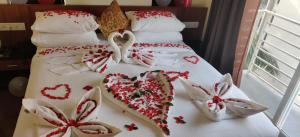 Postel nebo postele na pokoji v ubytování Hotel Jubilant