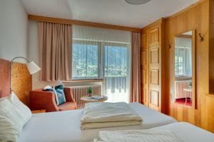 Postel nebo postele na pokoji v ubytování Hotel Jägerhof