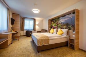 Postelja oz. postelje v sobi nastanitve R&R Residenzen HOTEL