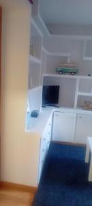 TV a/nebo společenská místnost v ubytování Apartamento en Formigal