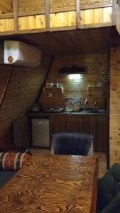 Kuchyň nebo kuchyňský kout v ubytování Quba Nature Family Home
