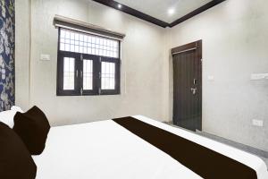 Postel nebo postele na pokoji v ubytování HOTEL O AKA HOTEL RESIDENCEs