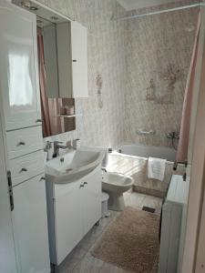 Koupelna v ubytování Apartment Olea + 30 fotografií