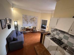 A kitchen or kitchenette at Rhome Holiday Mameli