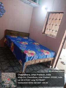 Postel nebo postele na pokoji v ubytování Himanshu Homestay