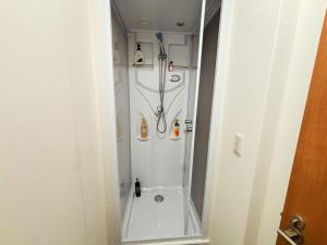 a bathroom with a shower with a shower at 花の郷田端a02 in Tokyo