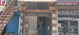 a view of a building with its doors open at krishna galaxy hotel in Kānpur