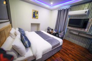 Posteľ alebo postele v izbe v ubytovaní Legend Hotel Skardu