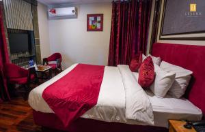 Posteľ alebo postele v izbe v ubytovaní Legend Hotel Skardu