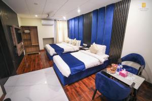 Posteľ alebo postele v izbe v ubytovaní Legend Hotel Skardu