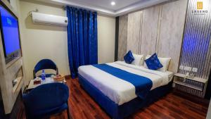 Posteľ alebo postele v izbe v ubytovaní Legend Hotel Skardu