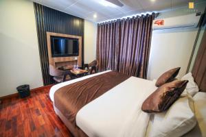 Posteľ alebo postele v izbe v ubytovaní Legend Hotel Skardu