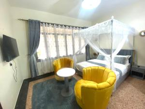 TV a/nebo společenská místnost v ubytování Well Spring Suites1
