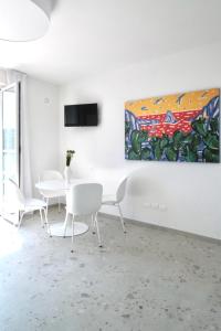 TV a/nebo společenská místnost v ubytování Residence I Gabbiani