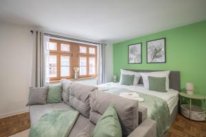 Ένα ή περισσότερα κρεβάτια σε δωμάτιο στο CoView - Pirna Altstadt - Parkplatz