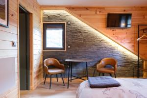 Posezení v ubytování Apart Hôtel des Cols