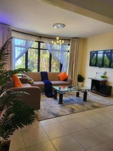 Posezení v ubytování G&G Executive lake view 2 Bedroom