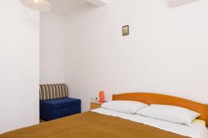 Posteľ alebo postele v izbe v ubytovaní Apartments Felix