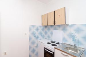 Kuchyňa alebo kuchynka v ubytovaní Apartments Felix