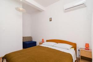 Posteľ alebo postele v izbe v ubytovaní Apartments Felix