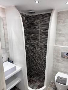 Koupelna v ubytování ALK Hotelᵀᴹ