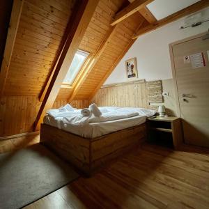 Posteľ alebo postele v izbe v ubytovaní Hotel Tarvisio Four Seasons