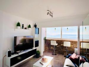 TV a/nebo společenská místnost v ubytování PANORAMIC D-LUXE