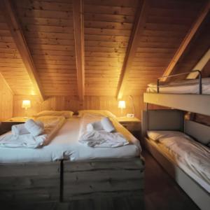 Posteľ alebo postele v izbe v ubytovaní Hotel Tarvisio Four Seasons