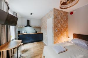Ένα ή περισσότερα κρεβάτια σε δωμάτιο στο Apartamenty z Duszą - Mickiewicza - Prywatny PARKING!!!