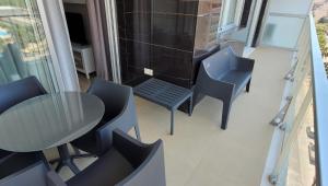 Posezení v ubytování Miramar apartamentos Cosmos + 11 fotografií