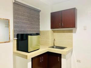 Kuchyň nebo kuchyňský kout v ubytování The Seaside Residences