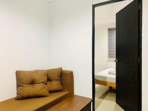 Postel nebo postele na pokoji v ubytování The Seaside Residences