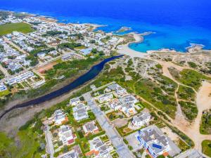 an aerial view of a city and the ocean at Dimora Cavallo a 150m da spiaggia sabbiosa in Torre Santa Sabina