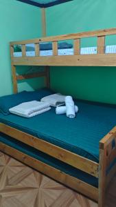 a bunk bed with two white towels on it at KBC ZAI Baguio Staycation 1 in Baguio