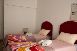 Postel nebo postele na pokoji v ubytování B&B Amore di Puglia