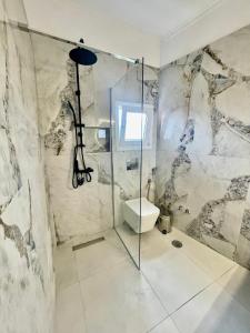 Bilik mandi di ANCH Apartment +38 gambar