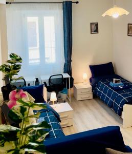 a living room with a bed and a couch at Muzien B&B in Imola
