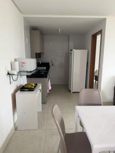 Η κουζίνα ή μικρή κουζίνα στο Flat maior SJ do mundo