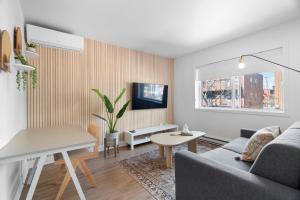 Uma TV ou centro de entretenimento em Hotel Laurence