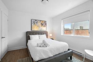 Cama ou camas em um quarto em Hotel Laurence
