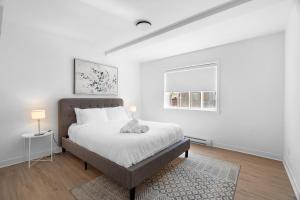 Cama ou camas em um quarto em Hotel Laurence