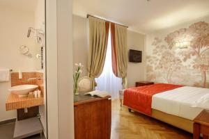 Postel nebo postele na pokoji v ubytování Vivaldi Luxury Rooms