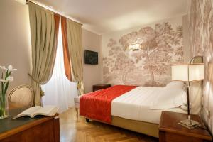 Postel nebo postele na pokoji v ubytování Vivaldi Luxury Rooms